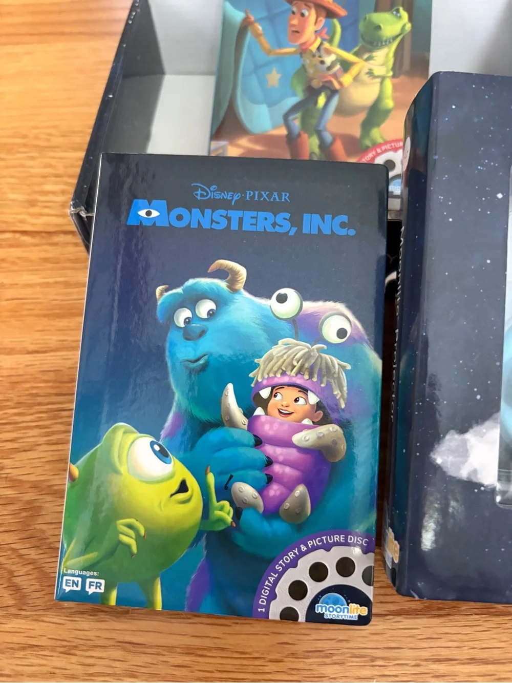 Moonlite Projector with Disney Pixar Story Reels - Blue